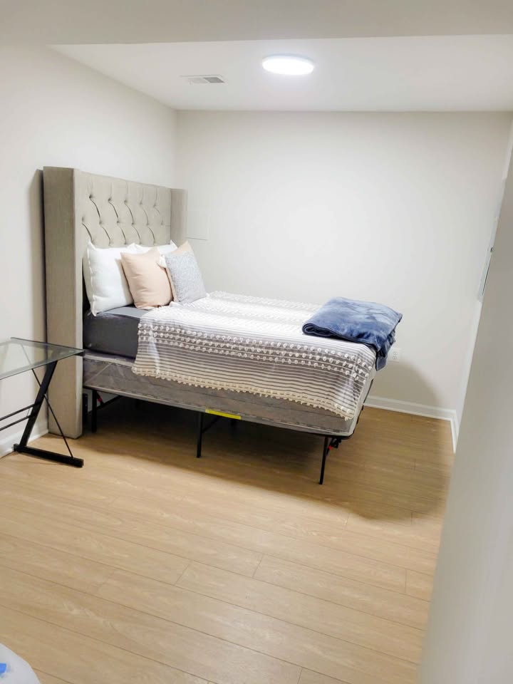 Room H bed and desk setup
