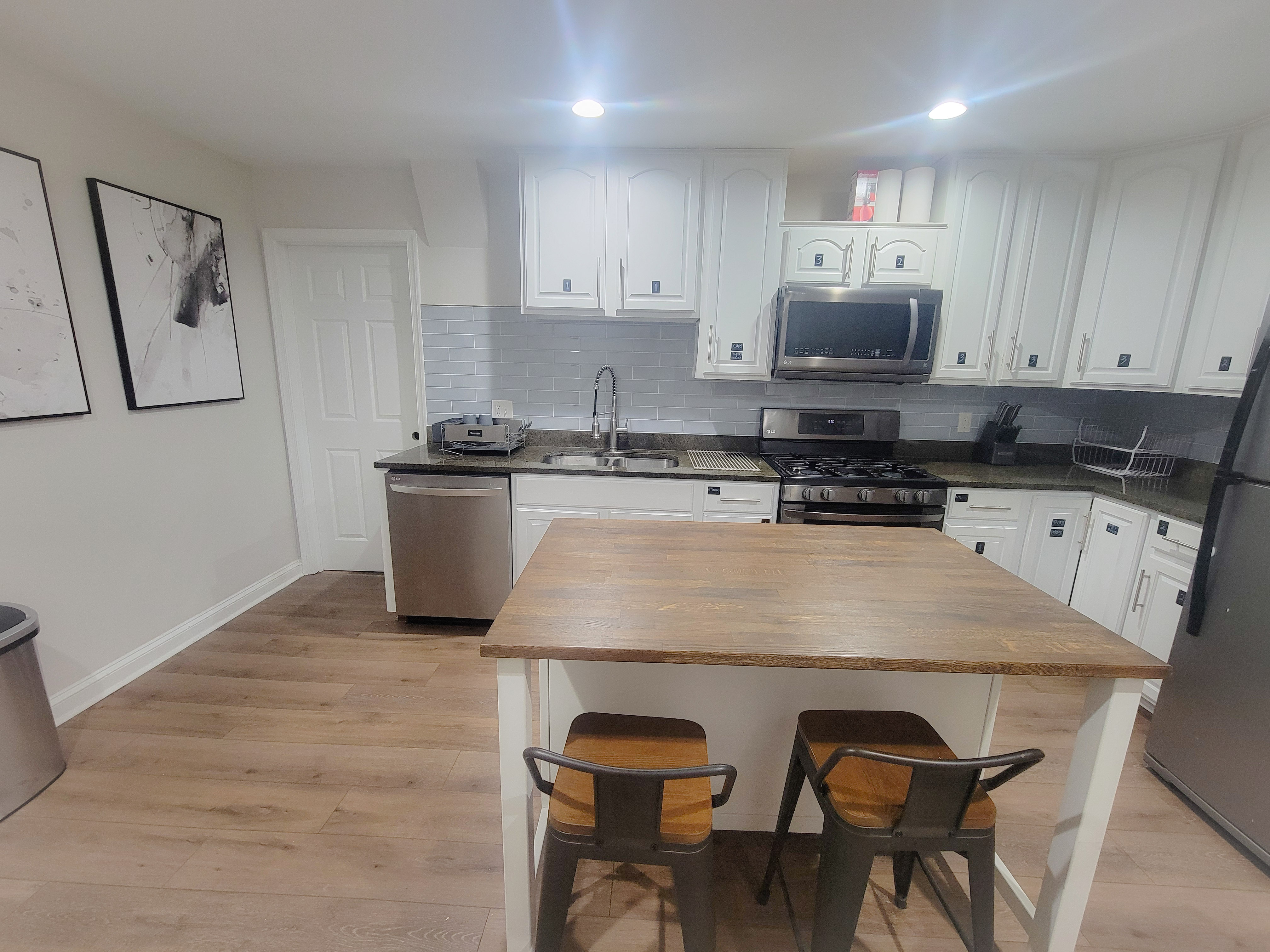 Kitchen with storage and island seating