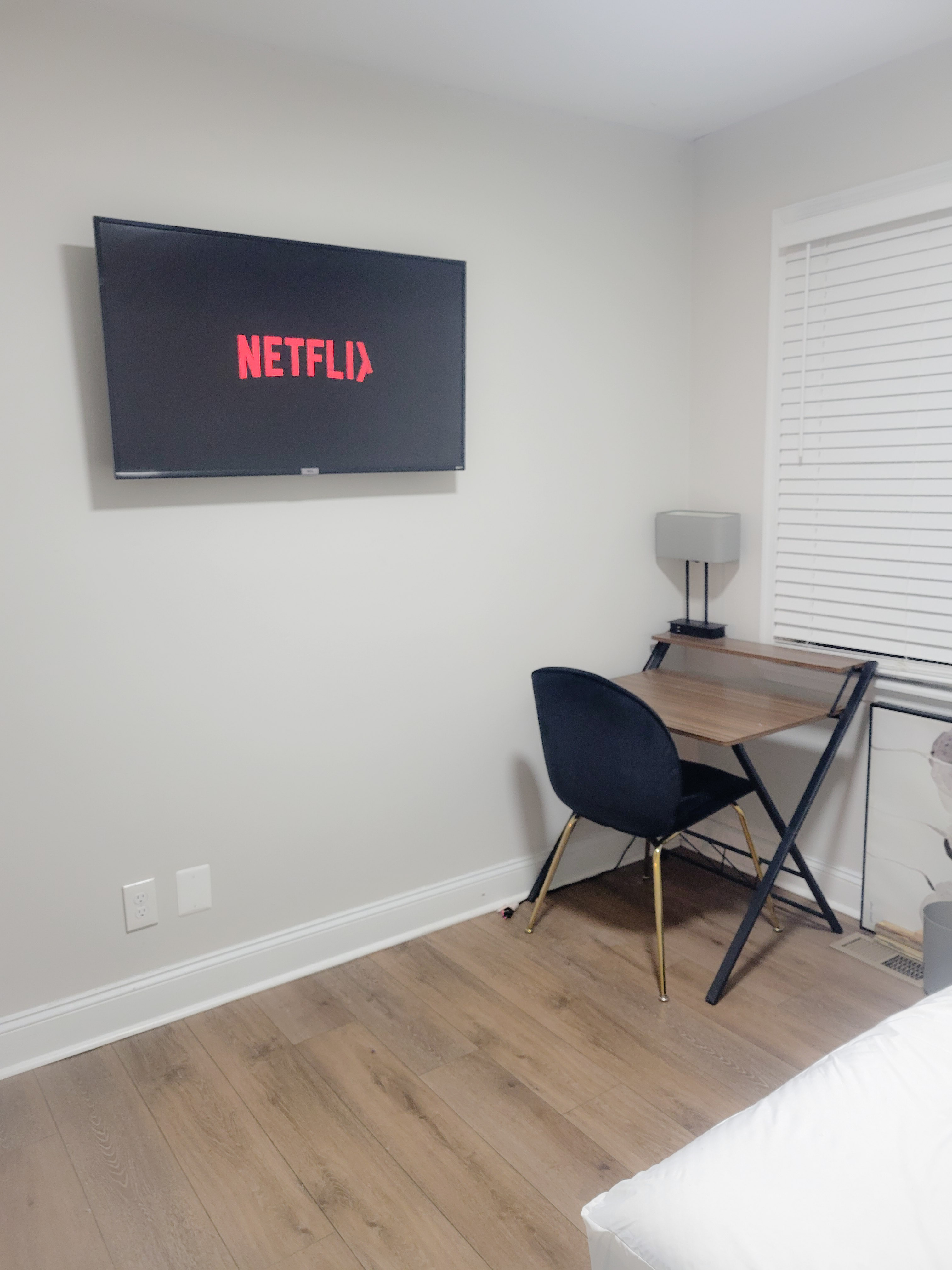 Room B bed, desk, and TV